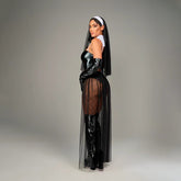 Woman wearing Disfraz Sister Sophia, a nun costume with rosary beads and headpiece